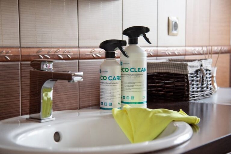 Nanotechnology - a bathroom sink with two cleaning products on it