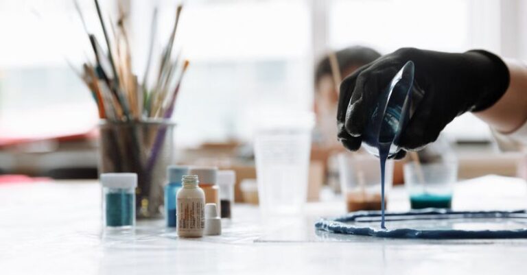 Polymers - Crop master pouring paint on clay