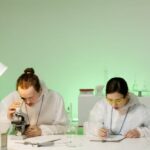 Microscopes - Man and Woman Working in Laboratory