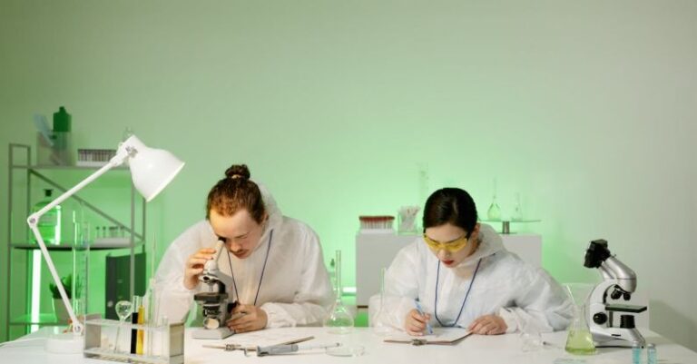 Microscopes - Man and Woman Working in Laboratory