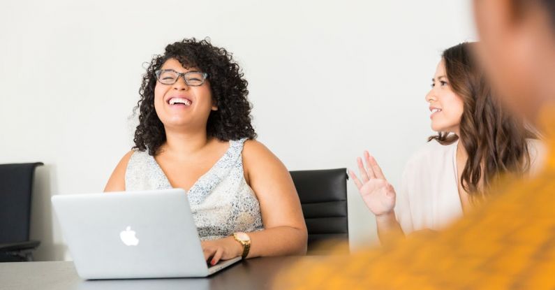 Engineering - Woman in White Dress in Front of Silver Macbook