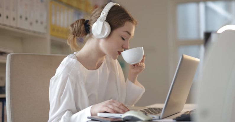 Engineering - Woman in White Dress Shirt Using White Laptop Computer