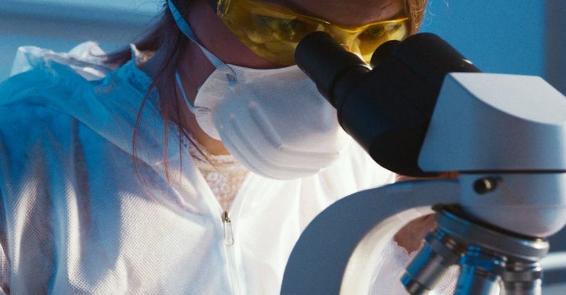 Microscopy - Photo Of Woman Looking Through Microscope